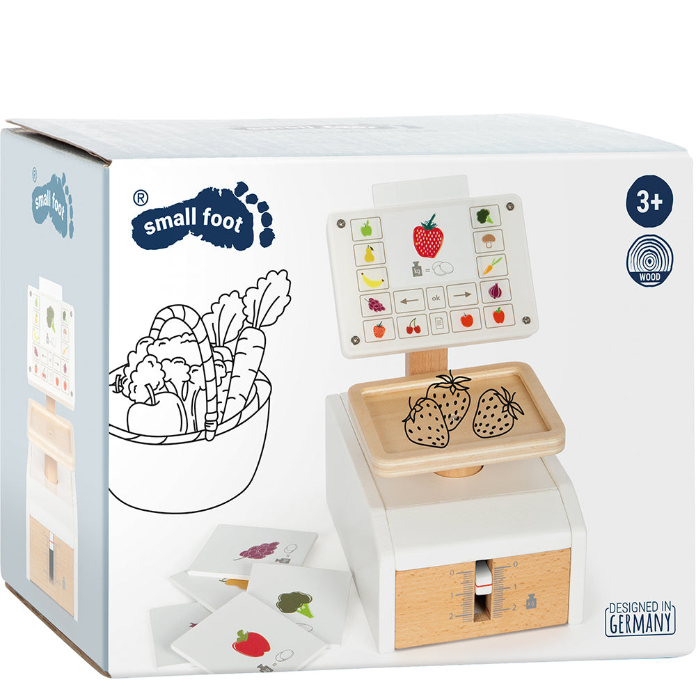 Das Waage „fresh“-Spielzeugwaagen-Set wird in einer Box mit Obst- und Gemüseabbildungen und Karten geliefert und ist für Kinder ab 3 Jahren geeignet.