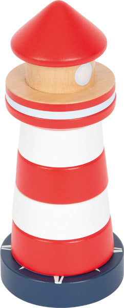 Stapelturm Leuchtturm Großer Ozean: Ein Spielzeug-Leuchtturm mit roten und weißen Streifen, einer roten Spitze und einem blauen Sockel.