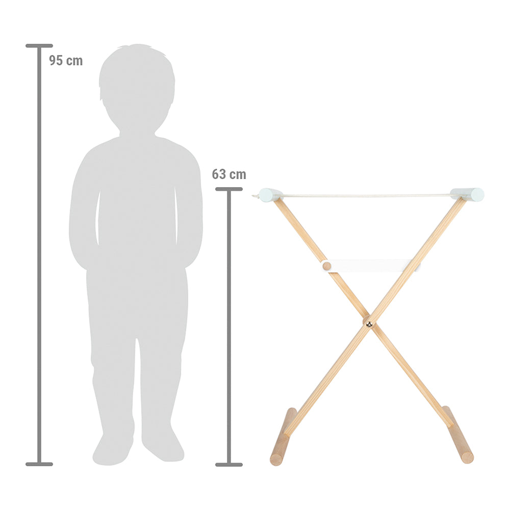 Der Wäscheständer, ein 63 cm hoher Wäscheständer aus Holz, wird zum Größenvergleich neben einer 95 cm großen Kindersilhouette gezeigt.