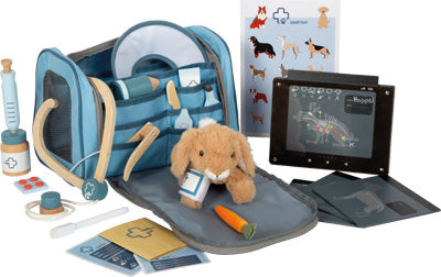 Veterinärmedizinisches Spielset für Kinder mit einem Plüschkaninchen, diversen Utensilien,medizinischen Werkzeugen, Röntgengerät und einer Tierkarte.