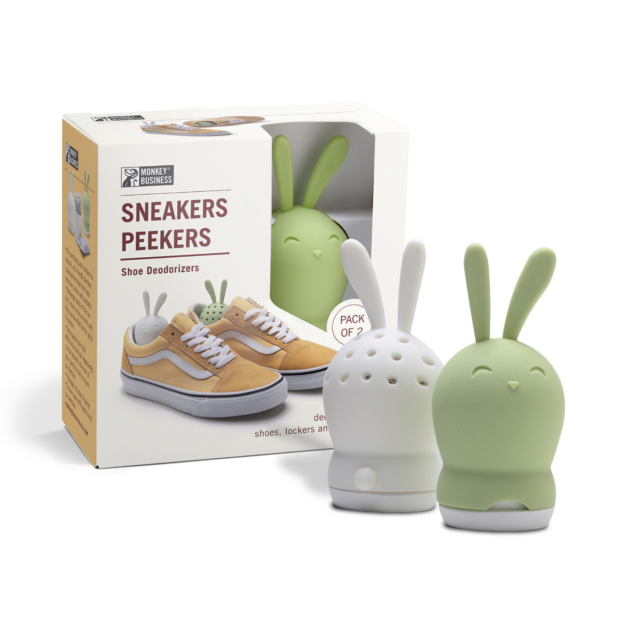 Zwei Aktivkohle Schuherfrischer Sneakers Peekers in Form von Häschen stehen neben ihrer Schachtel und zeigen das Produkt in den Sneakers.