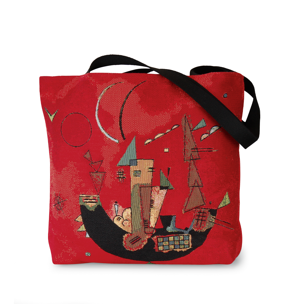 Rote Tragetasche mit schwarzem Riemen, mit abstrakten geometrischen Formen und bunten Häusern auf der Vorderseite. Inspiriert von Wassily Kandinsky ist dies die Schultertasche "Mit und Gegen".