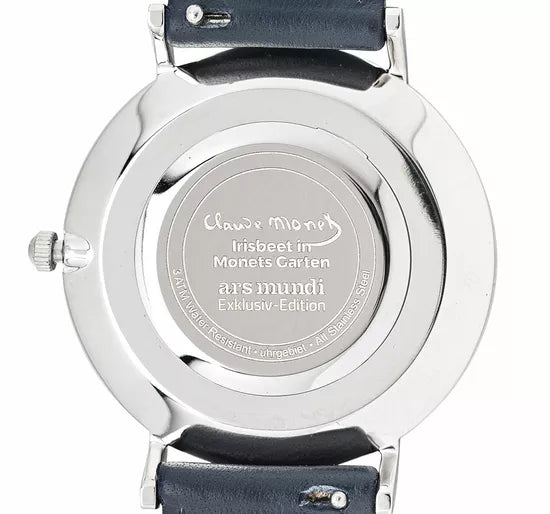 Rückseite einer silbernen Armbanduhr mit eingraviertem Text über Claude Monet und die ars mundi Exklusiv-Edition.