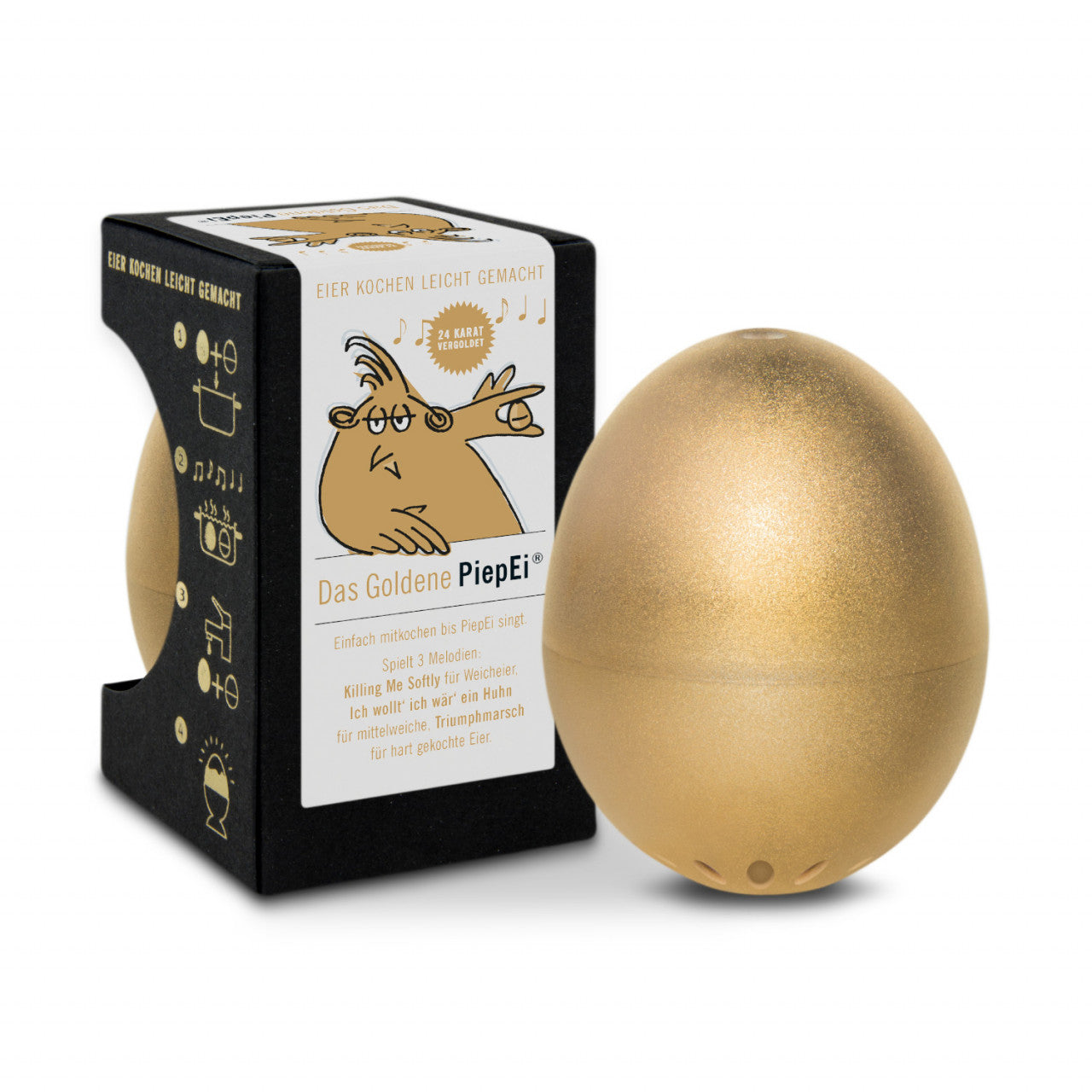 Ein goldener Timer in Eiform befindet sich neben einer schwarzen Das Goldene PiepEI-Box, die eine illustrierte Anleitung enthält.