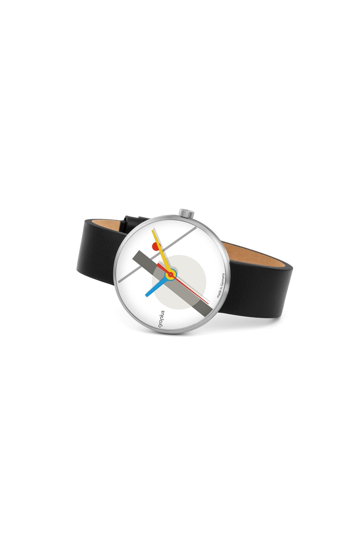 Eine Armbanduhr mit schwarzem Lederarmband hat ein weißes Zifferblatt und mehrfarbige abstrakte Zeiger in Gelb, Rot, Schwarz und Blau.