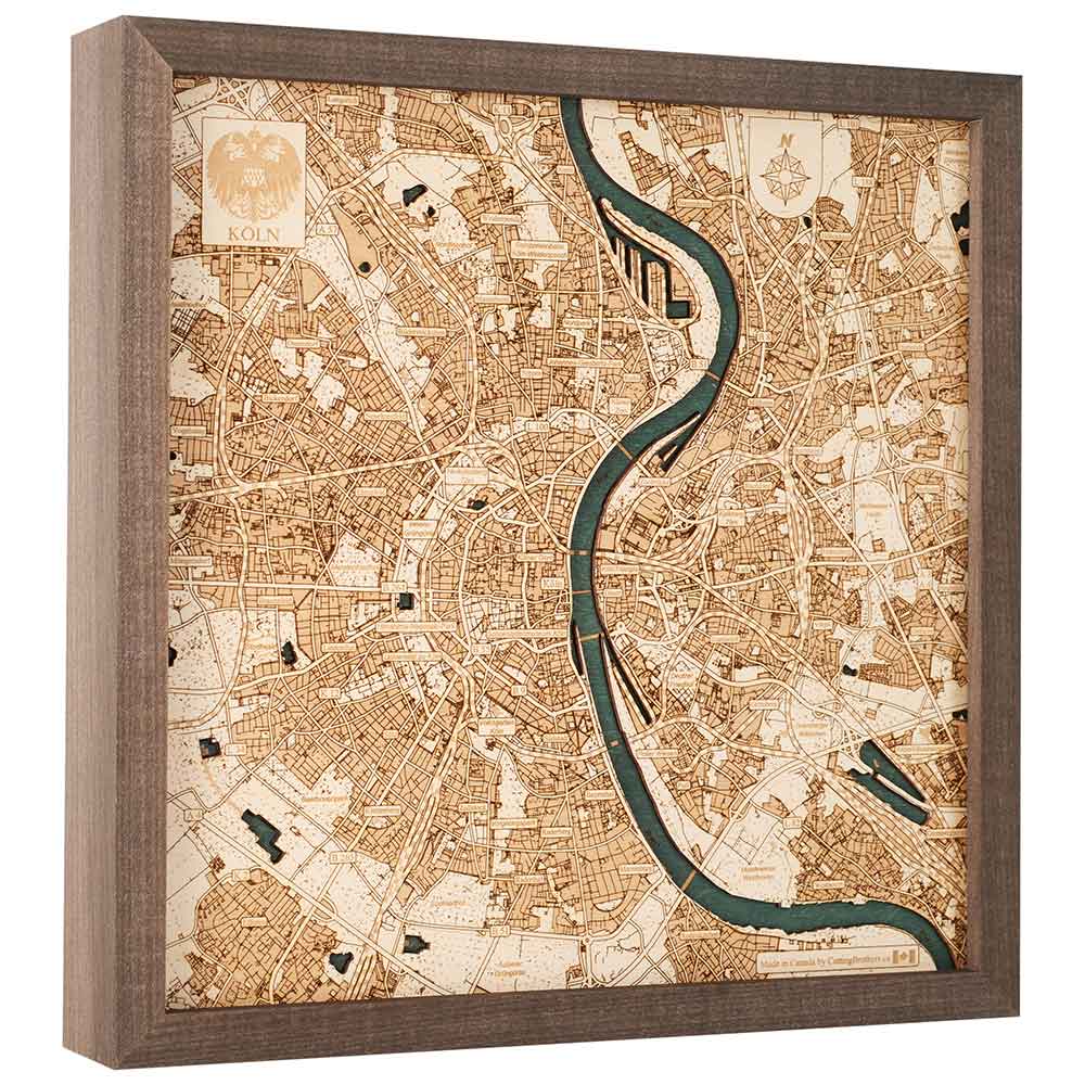 Gerahmte Holzkarte von Köln, Deutschland, mit Darstellung der Straßen und des Rheins in einer Draufsicht.