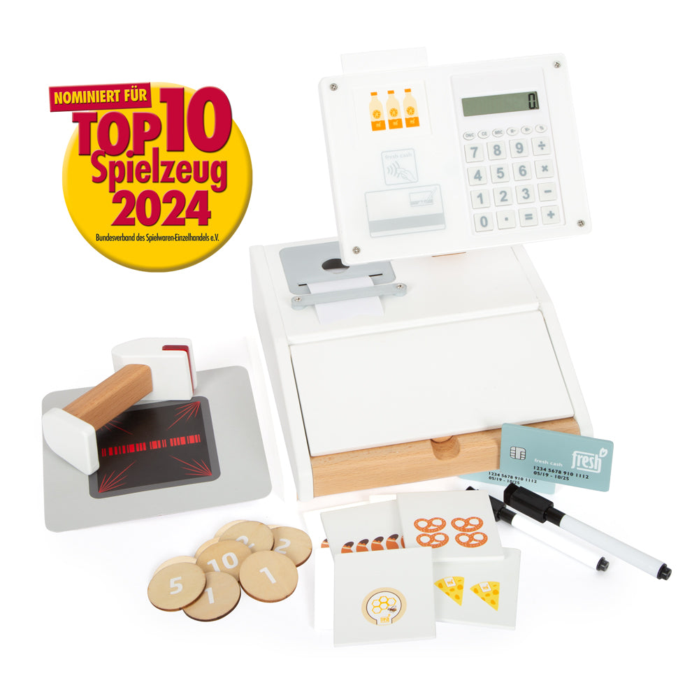 Kasse „fresh“ – Spielzeugkasse aus Holz mit Karten, Münzen, Pizzastücken und einem „Top 10 Spielzeug 2024“-Button.