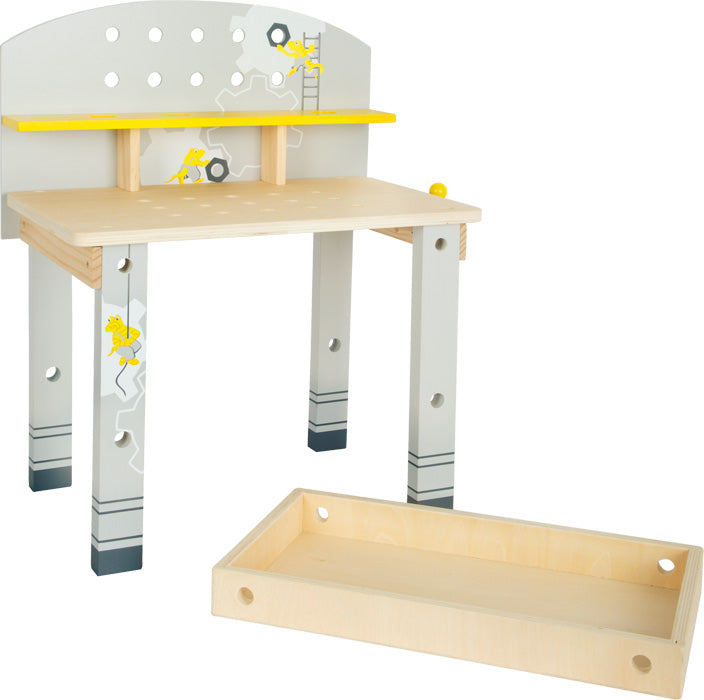 Die Werkbank kompakt „Miniwob“ ist eine Kinder-Spielwerkbank aus Holz mit einer gelben Ablagefläche und einer abnehmbaren Holzablage an der Vorderseite.