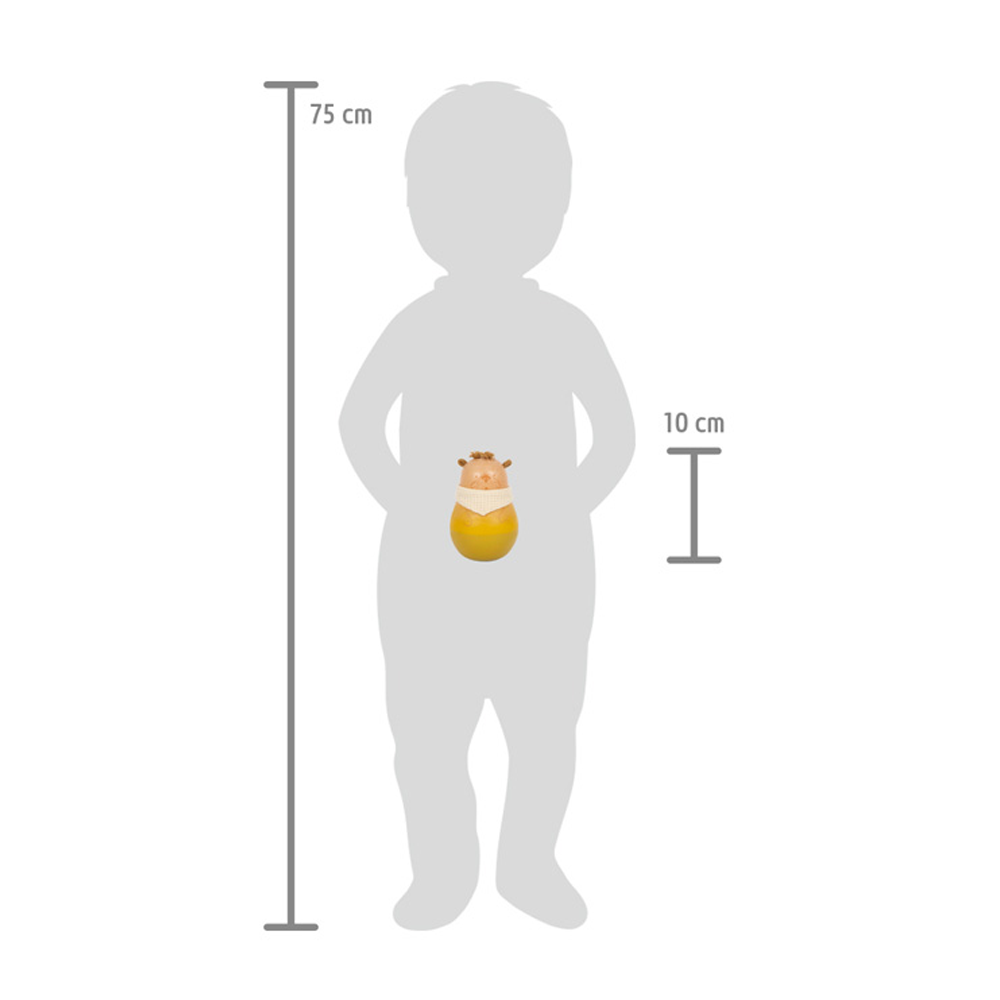 Silhouette eines 75 cm großen Kindes mit dem Baby Stehaufspielzeug „Seaside“ (10 cm) auf dem Bauch zum Größenvergleich.