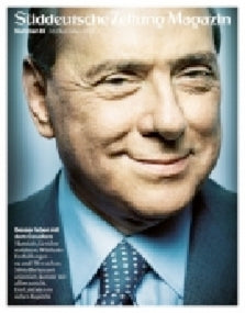 Nahaufnahme eines lächelnden Mannes in Anzug und Krawatte auf der Titelseite des Süddeutsche Zeitung Magazins.