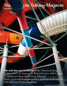 Bunte Wasserrutschen verflechten sich in einem Wasserpark, mit deutschem Zeitschriftentext als Overlay am unteren Rand.