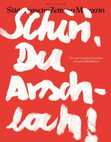 Roter Umschlag mit weißem Graffiti-Schriftzug "Schiri, Du Arschloch".