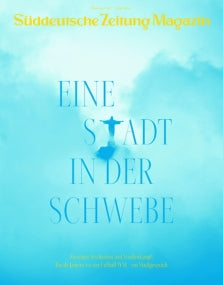Umschlag des Süddeutsche Zeitung Magazins mit blauem Himmel und Statue, Text: EINE STADT IN DER SCHWEBE.