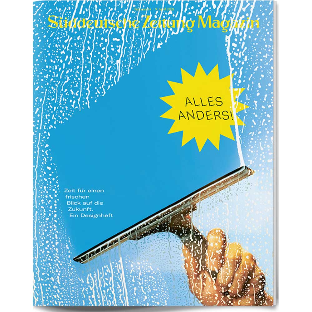 Eine Hand benutzt einen Abzieher, um seifiges Glas zu reinigen; auf dem gelben Stern steht ALLES ANDERS! auf Deutsch.