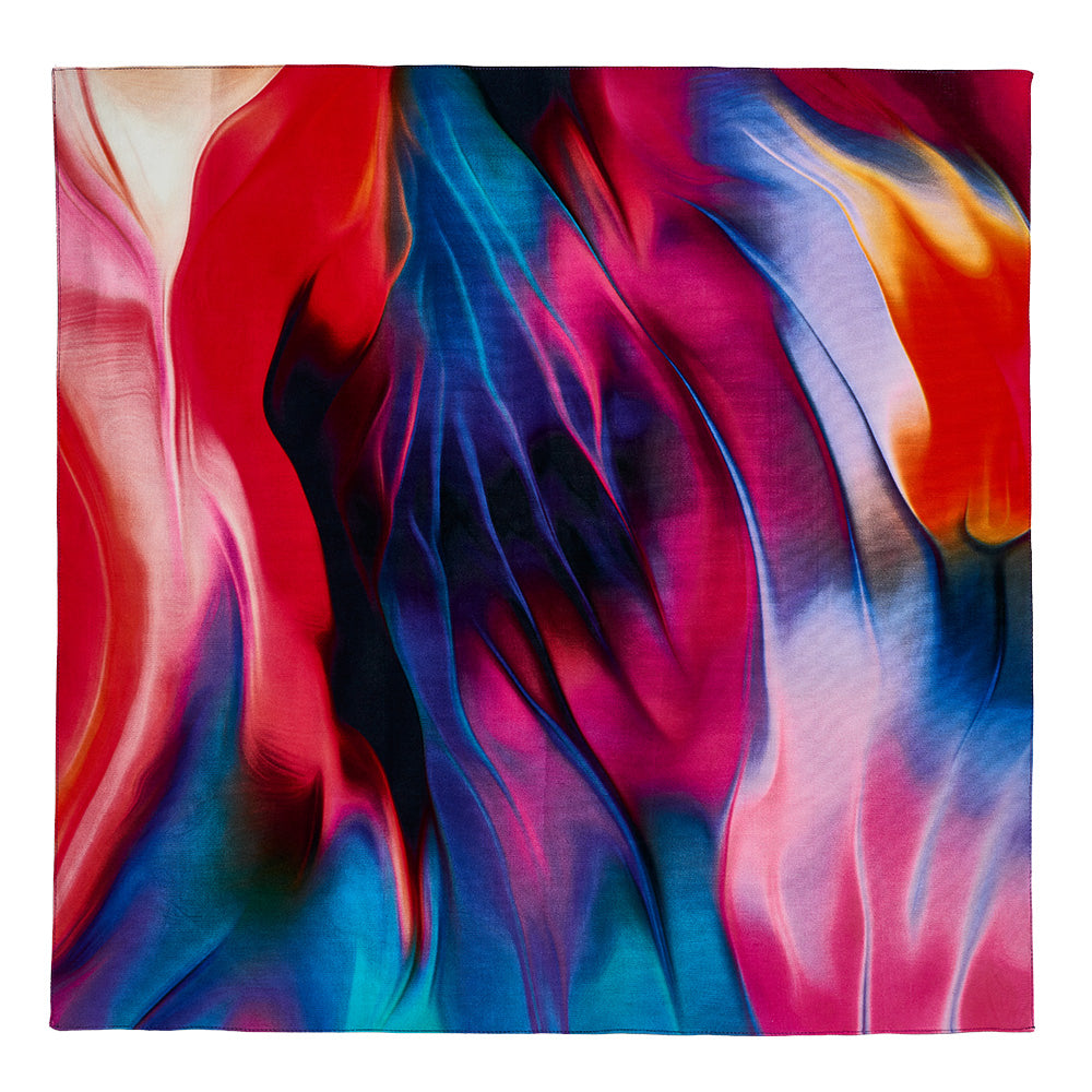 Abstrakte Kunst mit fließenden, leuchtenden Farben in Rot, Blau, Rosa und Lila, die in sanften Wellen ineinander übergehen.
