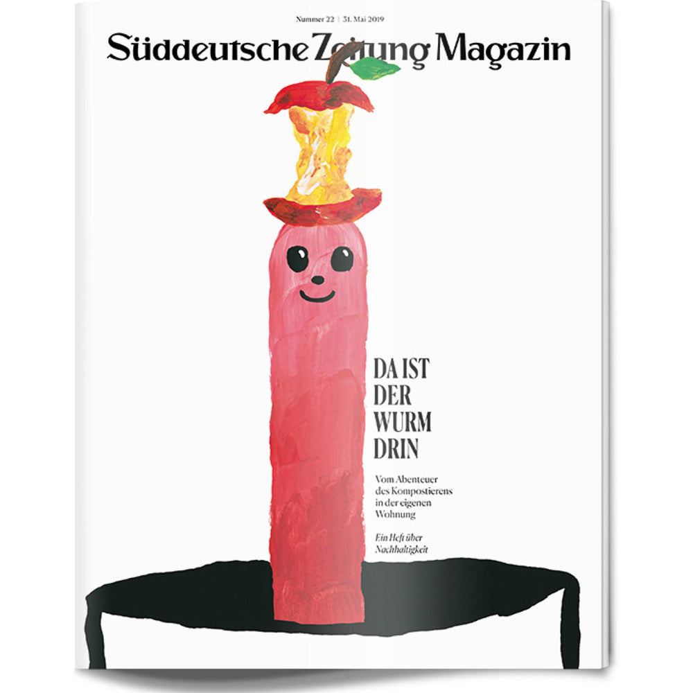 Ein lächelnder rosa Wurm mit einem Apfelhut ist auf dem Cover des Süddeutsche Zeitung Magazins zu sehen.