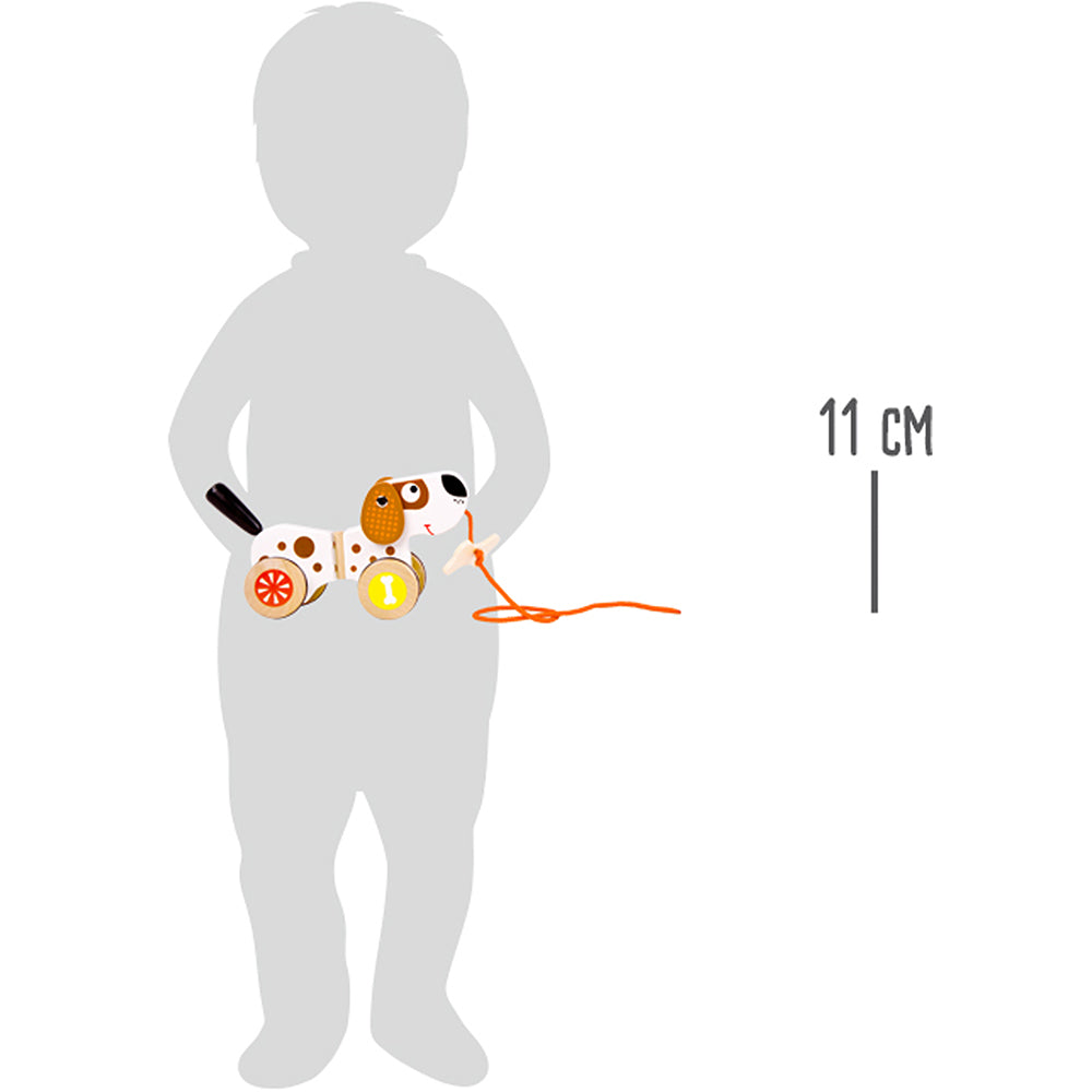Silhouette eines Kindes, das den Nachziehhund auf Rädern hält; Höhe: 11 cm.