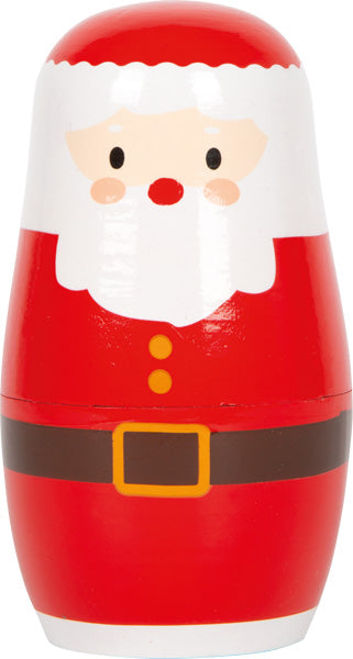 Eine hölzerne Nistpuppe, die so bemalt ist, dass sie wie der Weihnachtsmann aussieht, mit einem roten Anzug, weißem Bart und schwarzem Gürtel.