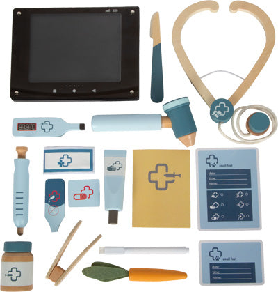 Spielzeug-Tierarztkoffer mit Stethoskop, Tablette, Spritze, Diagrammen und anderen Arztutensilien in Blau und Beige.
