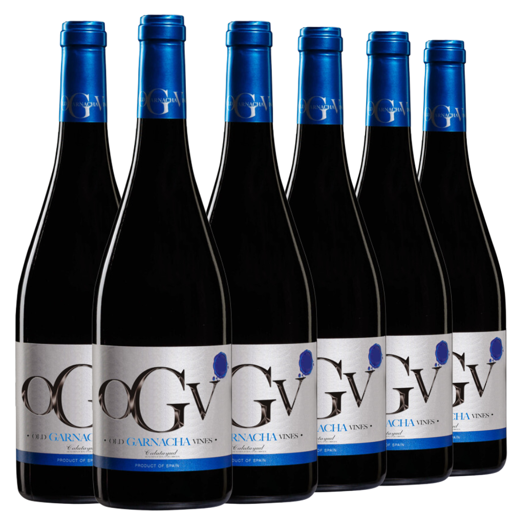 Sechs Flaschen Rotwein OGV Old Garnacha Vines 2021 mit blauen Verschlüssen und Etiketten, in zwei Reihen angeordnet.