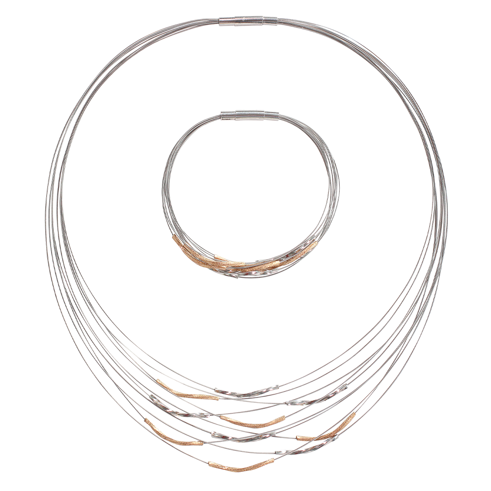 Schmuckset „Wellen“: silberne mehrreihige Halskette und passendes Armband mit goldenen Akzenten, abgebildet auf weißem Hintergrund.
