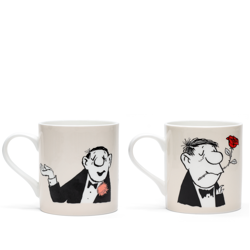 Set aus zwei weißen Porzellantassen, Loriot-Design: „Rosenkavalier“ & „Conférencier“, jeweils mit Comic-Männern im Smoking – einer lächelt mit einer roten Blume, der andere runzelt die Stirn und hält eine Rose im Mund.