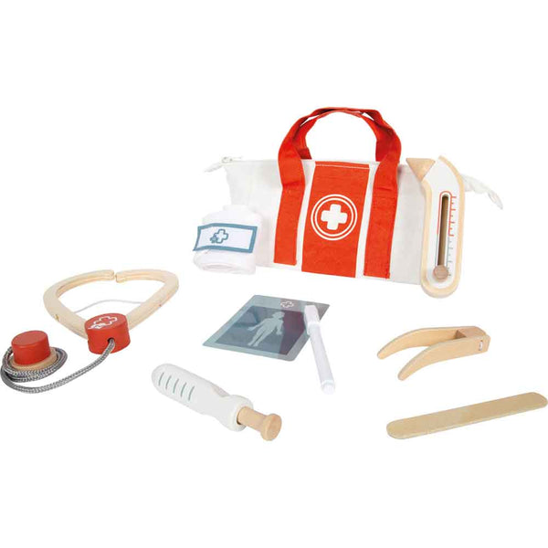 Kinderarzt-Spielset aus Holz mit Stethoskop, Fieberthermometer, Spritze, Medikamenten, Reflexhammer, Zungenspatel, Röntgengerät, Stirnband und rot-weißer Arzttasche.