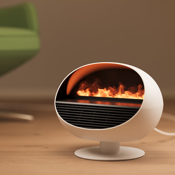 Ein moderner weißer Heizstrahler mit künstlichem Flammeneffekt steht auf einem Holzboden neben einem grünen Stuhl.