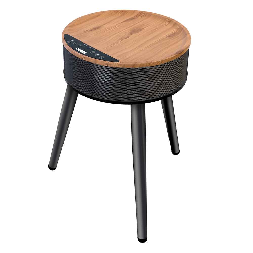 Runder Holztisch mit schwarzen Beinen und eingebauten Heizlüfter  an der Seite.