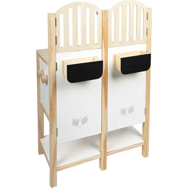 Pferdestall aus Holz mit offenen Ablagefächern, einer weißen Frontplatte und aufgesetzten rechteckigen Schalen, für Kinder konzipiert.