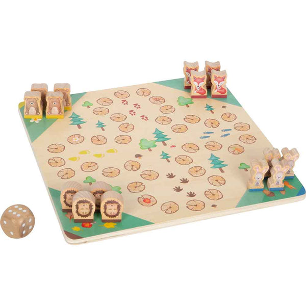 Ein Brettspiel aus Holz mit Tierfiguren (Igel und Füchse, Bären und Hasen) in jeder Ecke, einem Würfel und einem mit Blättern, Bäumen und Wegen verzierten Brett.
