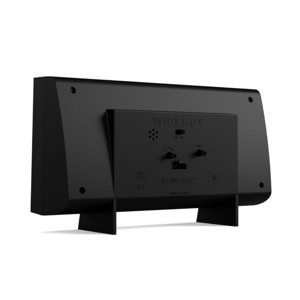 Schwarze rechteckige Digitaluhr von hinten gesehen, mit Batterie- und Einstellfächern.