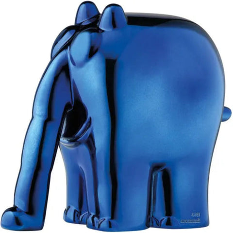 Eine glänzende blaue Elefantenskulptur mit stilisiertem, abstraktem Design, von der Seite betrachtet.