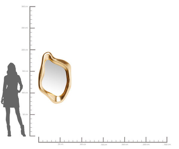 Asymmetrischer, goldgerahmter Spiegel an der Wand, daneben die Silhouette einer Frau als Maßstab.