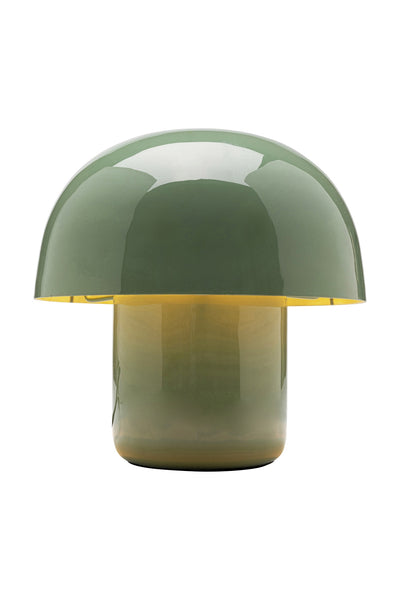 Grüne Tischleuchte in Form eines Pilzes mit glänzender Oberfläche, abgerundetem Kuppelschirm und zylindrischem Sockel, fotografiert vor einem weißen Hintergrund.