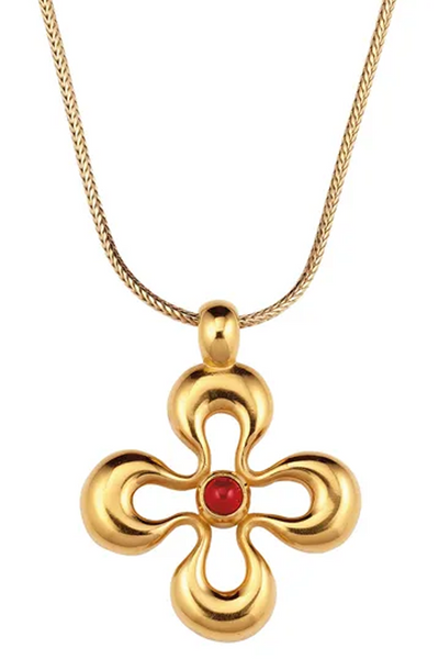 Das Bild zeigt das Collier mit einem Anhänger in Form einer Blume und einem heilbringendem Granat als Glücksstein in der Mitte. 
