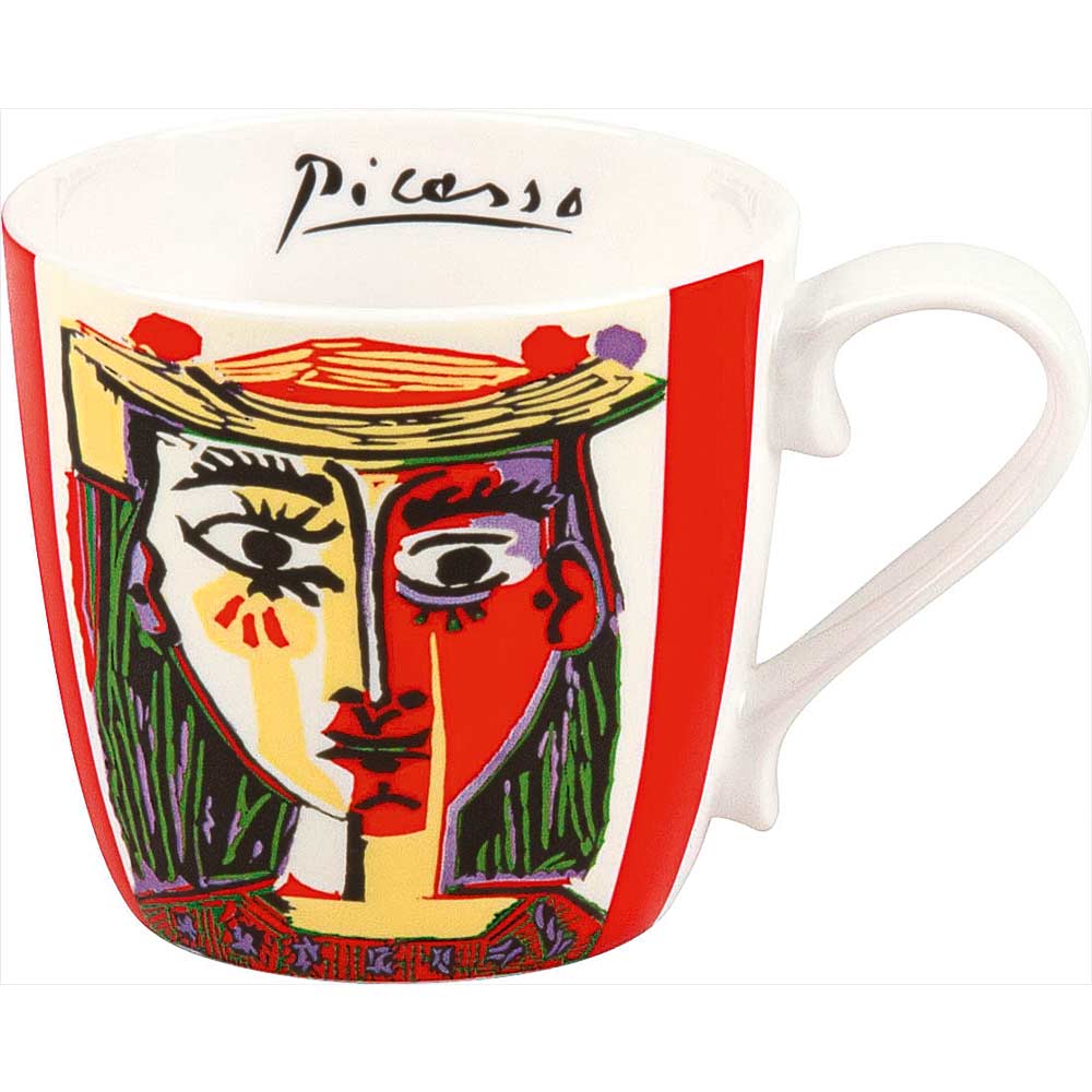 Eine Keramiktasse mit einem farbenfrohen abstrakten Gesicht im Picasso-Stil und der Signatur des Künstlers am Rand.