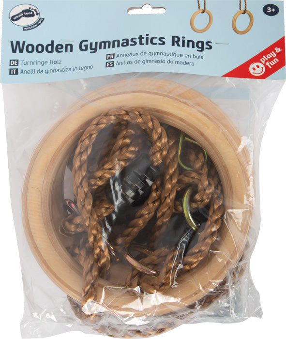 Zwei Turnringe Holz mit braunen Seilen, verpackt in einer durchsichtigen Plastiktüte mit beschriftetem Kopf.