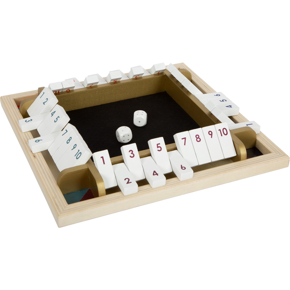 Das Würfelspiel Shut the Box „Gold Edition“ besteht aus nummerierten Spielsteinen und zwei weißen Würfeln in der Mitte des Spielbretts.