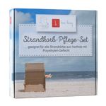 Eine Schachtel mit der Aufschrift „Strandkorb-Pflege-Set“ mit einer Strandszene und einem Strandkorb auf der Vorderseite.
