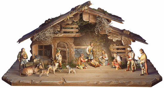 Weihnachtskrippe mit Figuren von Maria, Josef, Jesuskind, Hirten, Tieren und einem rustikalen Holzstall.