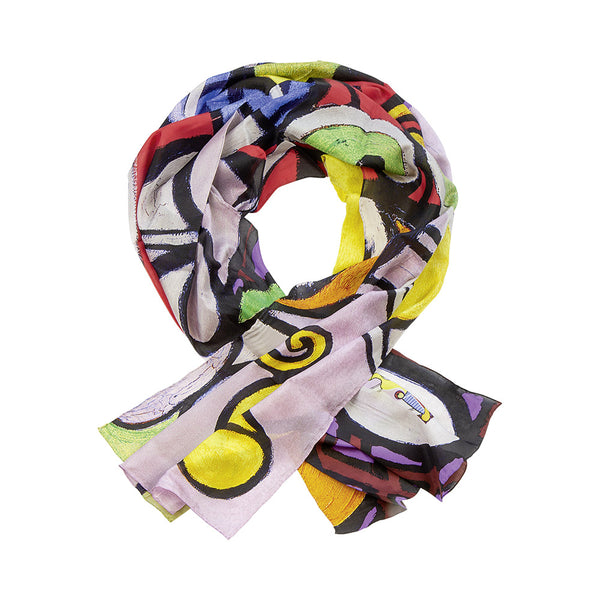 Ein farbenfroher, gemusterter Schal mit abstrakten Motiven, locker zu einer Schlaufe gefaltet.