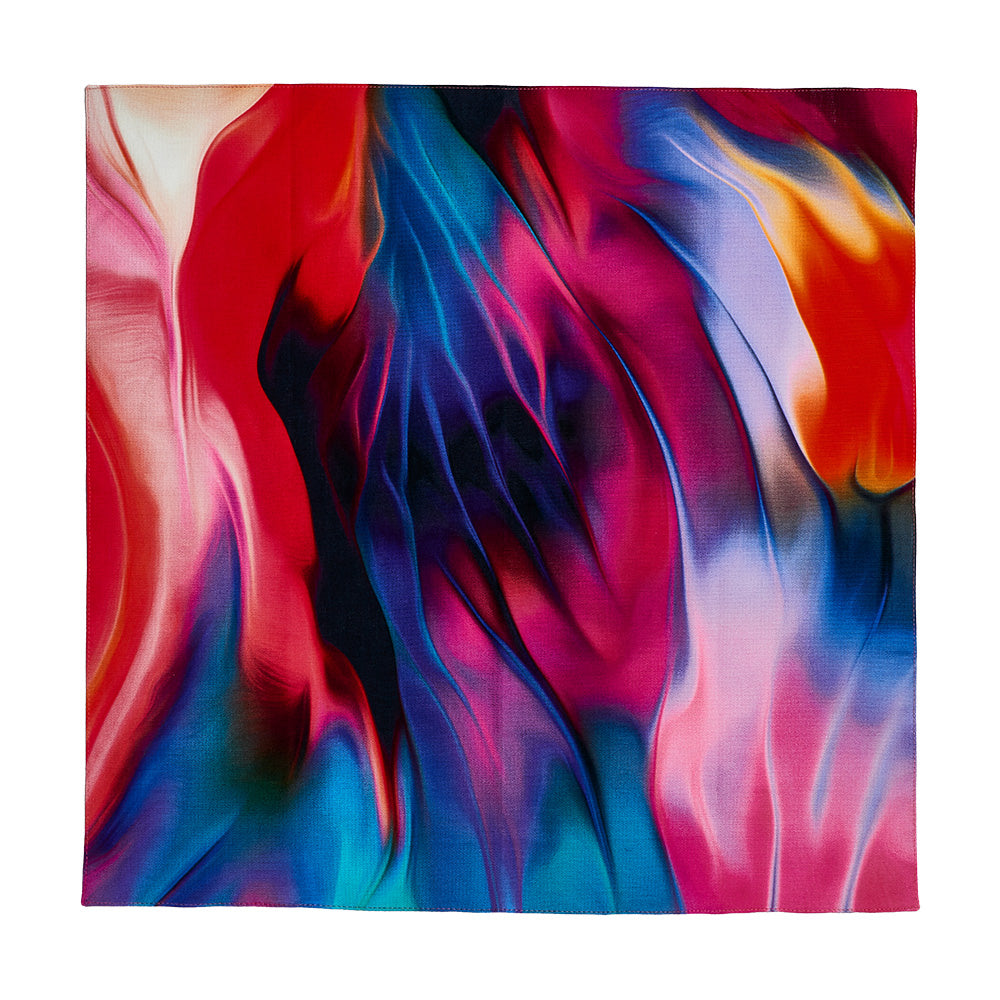 Abstrakte Kunst mit wirbelnden, leuchtenden Farben aus Rot, Blau, Rosa, Gelb und Lila, die ineinander übergehen.