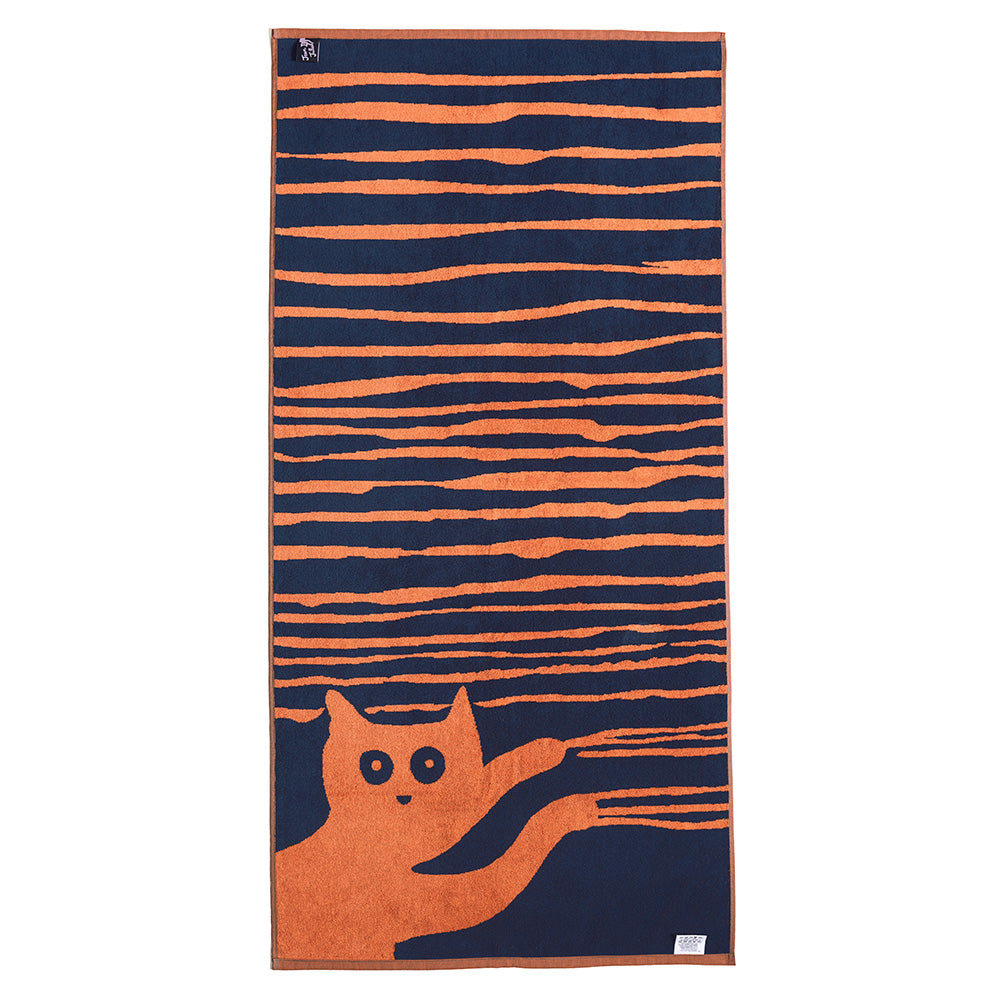 Rechteckiges Handtuch mit einer orangefarbenen Katze, die nach oben zu orangefarbenen Streifen auf dunkelblauem Hintergrund greift.