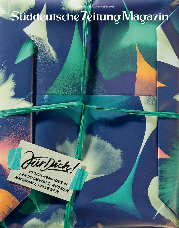 Buntes abstraktes Geschenkpapier mit der Aufschrift Für Dich! und dem Titel Süddeutsche Zeitung Magazin.