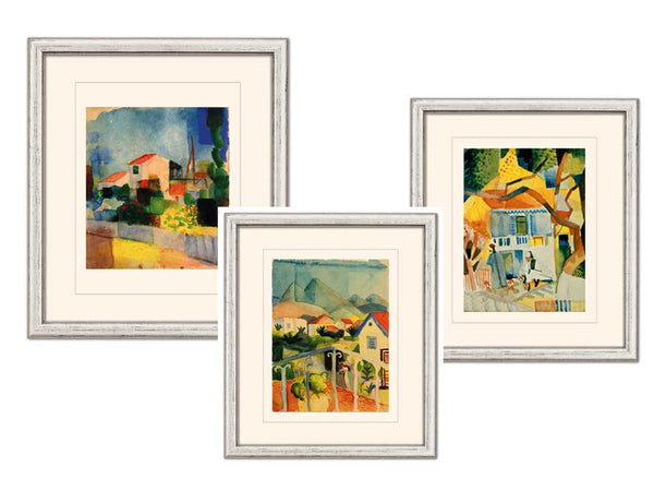 Drei gerahmte Gemälde bunter Häuser, jedes in einem ausgeprägten abstrakten, impressionistischen Stil.