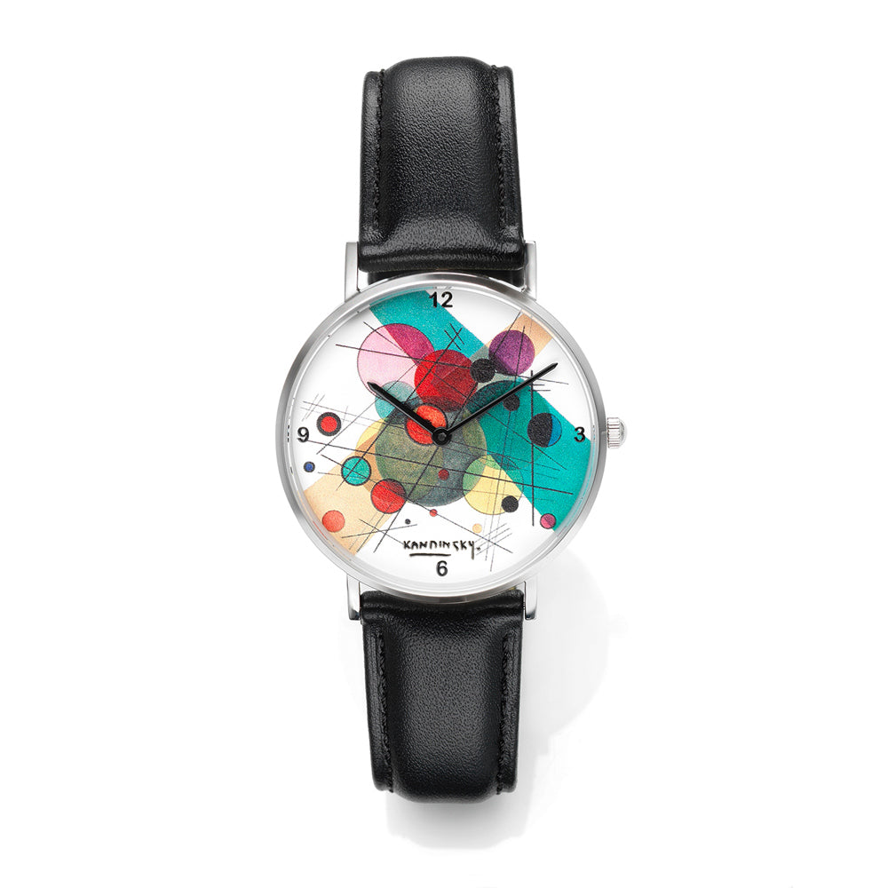Armbanduhr mit schwarzem Lederarmband und farbenfrohem abstraktem geometrischem Design auf dem Zifferblatt.